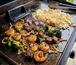 Blackstone griddle cooking smash burgers, fried rice, vegetables, pancakes, and other easy Blackstone recipes outdoors