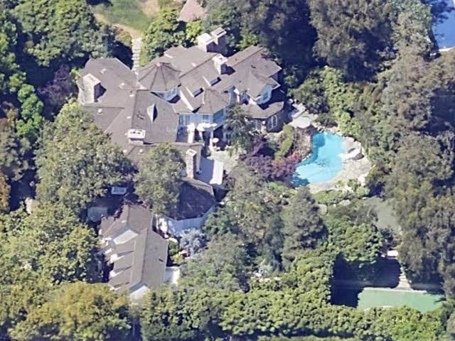 "Front exterior view of a luxury-style home representing Adam Sandler's private Los Angeles residence in Pacific Palisades."