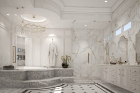 Elegant luxury bathroom design featuring a freestanding bathtub, marble walls, walk-in glass shower, double vanity, and warm ambient lighting.