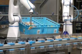 Smart food processing facility using automated robots, conveyor systems, IoT sensors, and digital dashboards to optimize the foodtech automation supply chain.