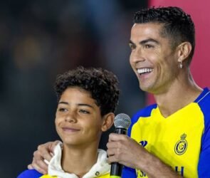Cristiano Ronaldo Jr playing football during a youth academy match while developing his skills as a young forward.