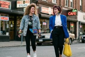 What was 80s fashion with neon clothing, shoulder pads, denim, and bold 1980s accessories
